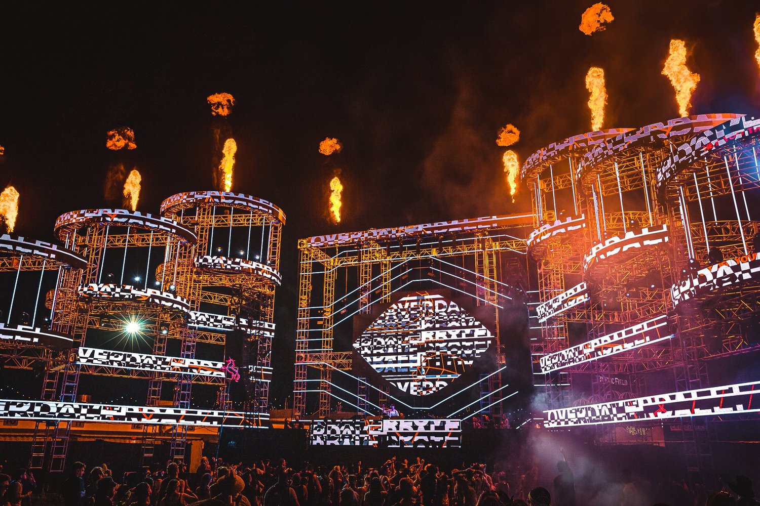 Cloverdale on a festival stage with flames and towering screens
